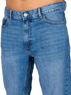 Dr. Denim Clark Ripped Slim Tapered Jeans - Rubble Mid Blue 10 Dr. Denim Clark Ripped Slim Tapered Jeans - Rubble Mid Blue -Standout Fashion Shop 44859e