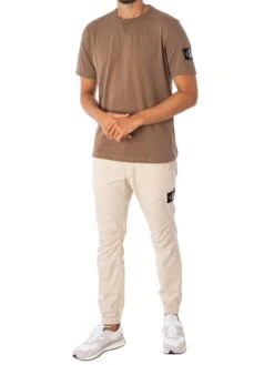 Calvin Klein Jeans Monologo Badge Casual Trousers - Classic Beige 11 Calvin Klein Jeans Monologo Badge Casual Trousers - Classic Beige -Standout Fashion Shop 46560f